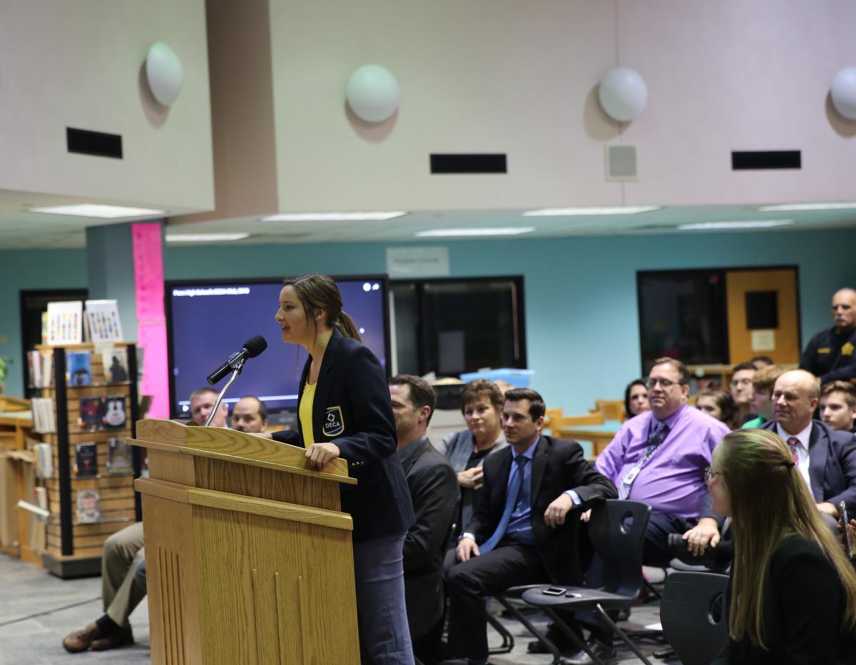 Student presenting at Board Meeting