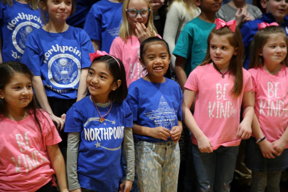 Students performing for Board of School Trustees