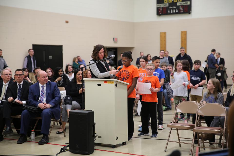 Principal Christy Campbell & Elsie Rogers students updating the Board