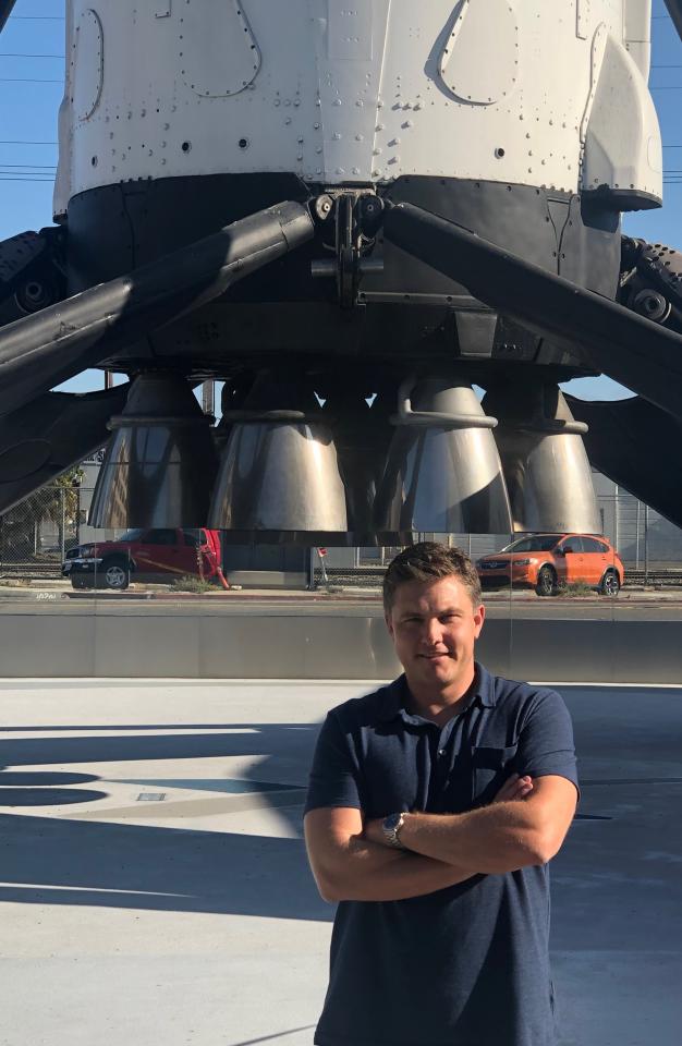 Jon Edwards in front of Falcon 9 rocket
