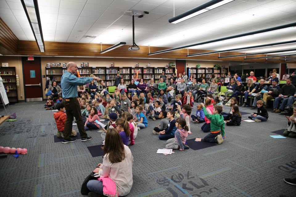Children's author/illustrator Troy Cummings working with P-H-M students