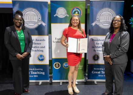 Mrs. Fox receiving her award