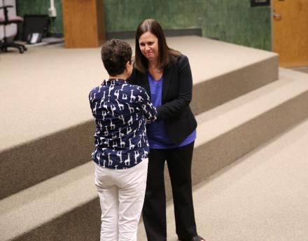 Sheryll Harper helps introduce Elizabeth Willkom-Cunha to Discovery staff on June 6