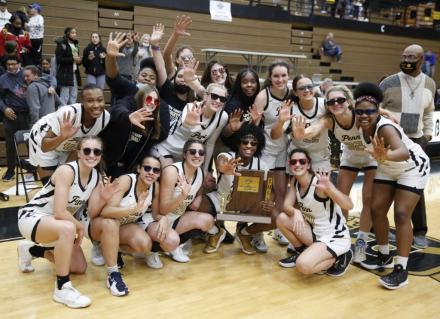 The Penn Girls Basketball Team celebrates the Sectional title.