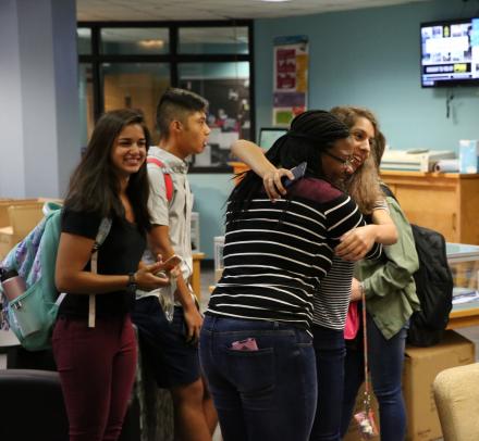 Penn students hugging each other on the 1st Day of School
