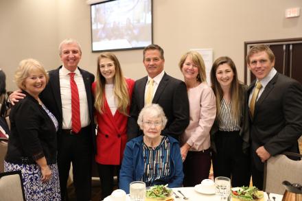 (left to right) Mrs. Donna Thacker, Dr. Jerry Thacker, Sarah Hildebrandt, Father: Chris, Mother: Nancy, Sister: Amy, Penn Wresting Coach Brad Harper, (sitting) Sarah's Grandmother