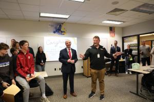 Dr. Thacker surprises Mr. Eric Bowers during class