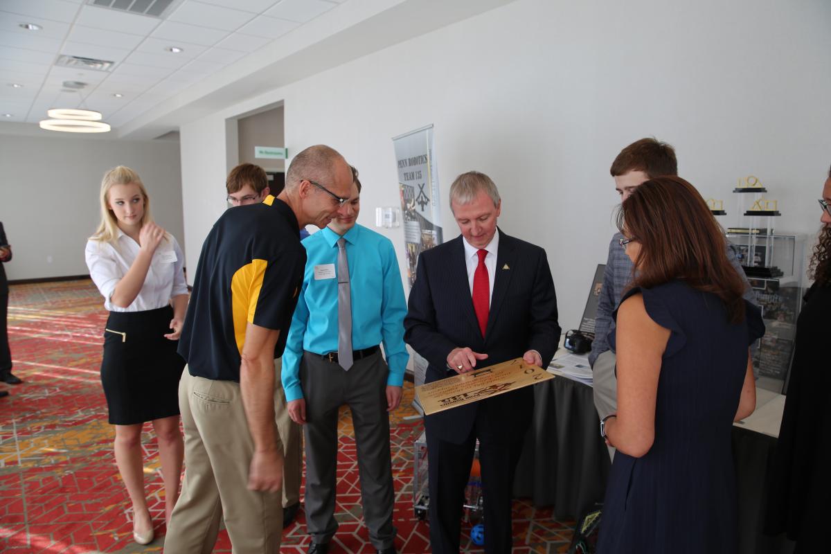 Dr. Thacker & Mari Linn Wise talking with Penn Robotics students