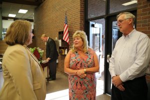 Dave Misener and his wife talk with Dr. Denise Seger.