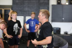 Wrestling Camp 2017 - Coach Brad Harper instructs campers