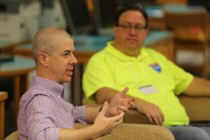 Keynote speaker Brian Mull engages in small group discussion