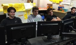 Penn STEM Academy students wait to meet prospective students.