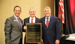Dr. Thacker receiving his award from IAPSS