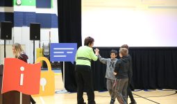 Rep. Walorski playing "Guess my Password" game with Schmucker students