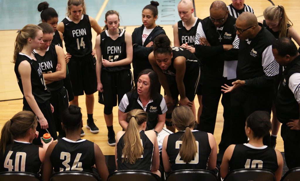 Penn Coach Kristi Ulrich with the Penn Girls Basketball team