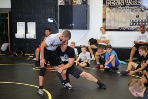 Coaches Brad Harper & Chad Hershberger demonstrate for campers