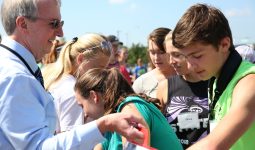 Dr. Thacker handing out popsicles