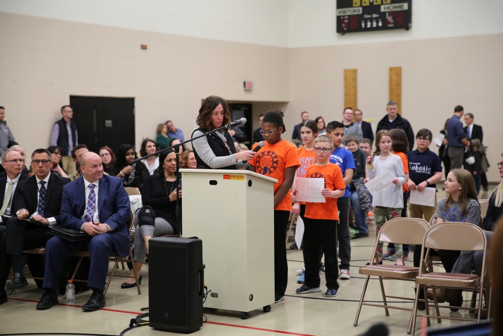Principal Christy Campbell & Elsie Rogers students updating the Board