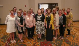 Elementary Teacher of the Year Christine Austin poses with fellow Walt Disney teachers and administrators