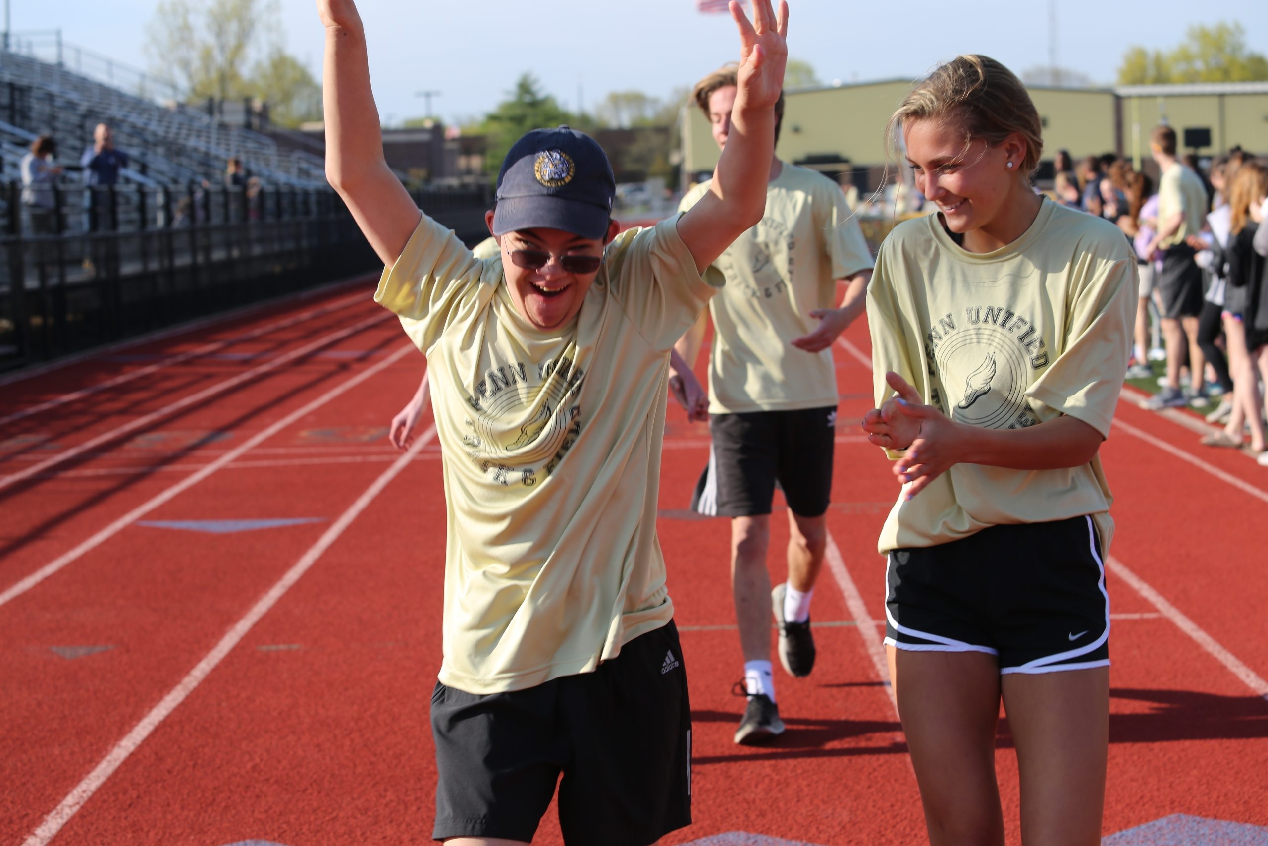 students rejoice after finishing a race