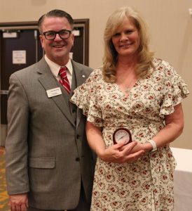 Chris Riley with Ann Lira, 4th grade teacher, Horizon Elementary, Retiring with 20 Years of Service with PHM