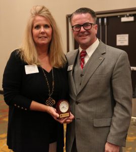 Chris Riley with Shelly Sierzputowski, 6th grade Social Studies teacher & Athletic Director, Schmucker Middle, Retiring with 35 Years of Service