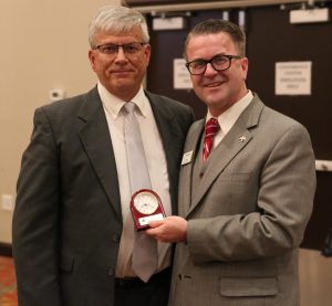 Chris Riley with Trent Yeoman, Math teacher & Coach, Penn High School, Retiring with 35 Years of Service