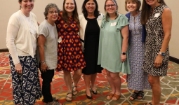 Retiring Director of Human Resources Dr. Lisa Soto Kile with Elm Road Elementary School Staff