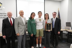 Mrs. Clare Roach recognized with her family
