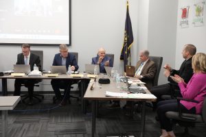 Board Members clap for Jim Garrett