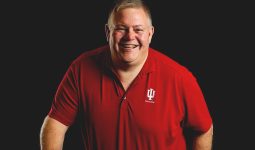 Man in red IU shirt smiling