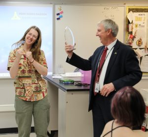 Teacher dancing after winning award
