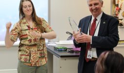 Teacher dancing with joy after winning award