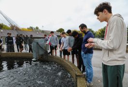 Students in Mr. Lopez's class feed Rainbow Trout at the Bodine State Fish Hatchery in Mishawaka, Ind.