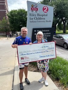 Schmucker Middle School Staff Bike 153 Miles to Deliver Riley Hospital Donation Check