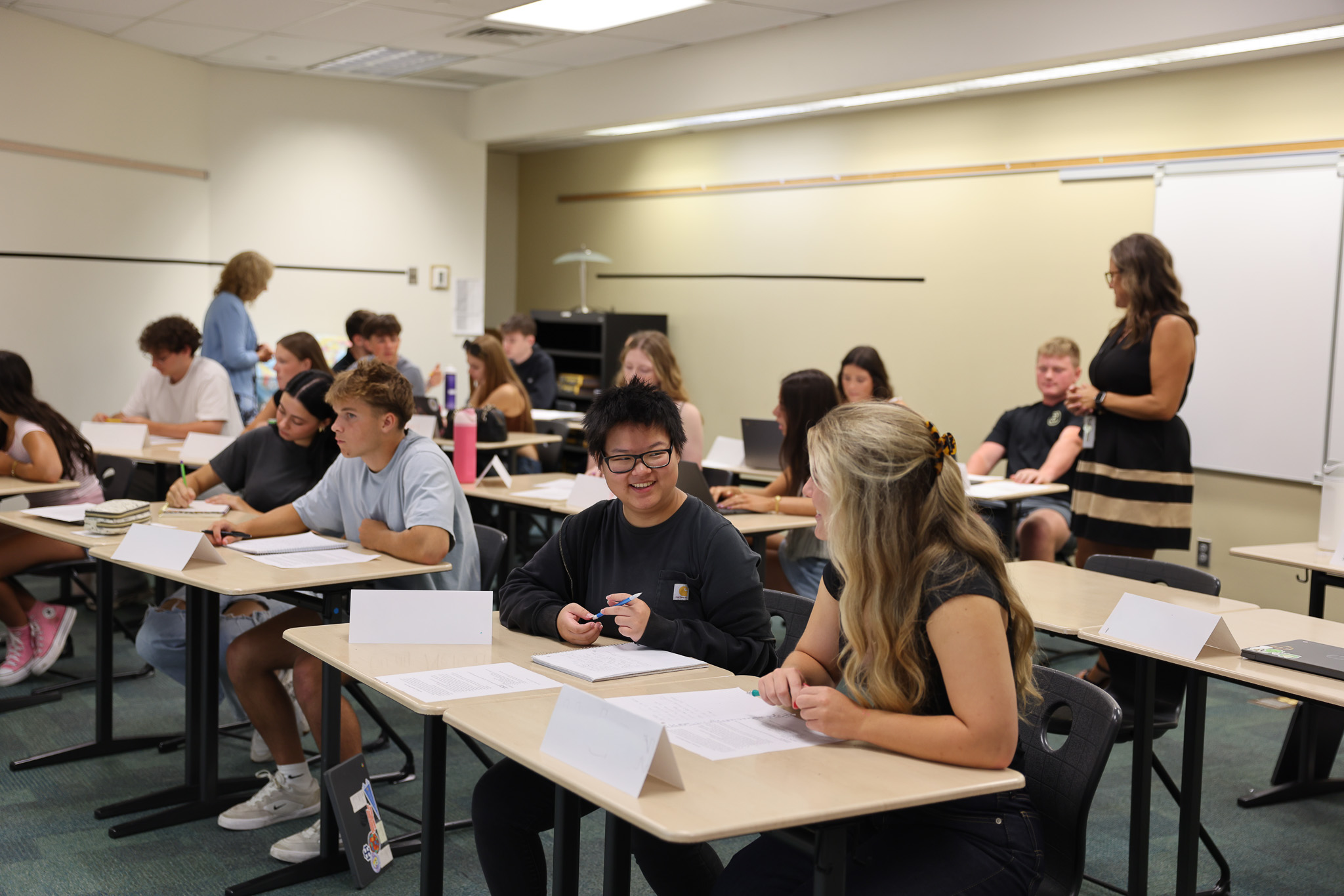 Penn High School students discussing a class assignment