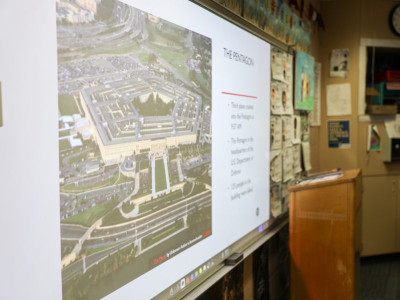 Maggie Hufford's 7th grade Social Studies 9-11 25th Anniversary class discussion and pictures of the flag outside the school flying at half-staff on 9-11-26